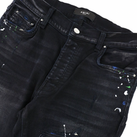 Amiri Paint Splatter MX1 Aged Black