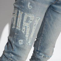 Amiri Distressed Logo Jeans Clay