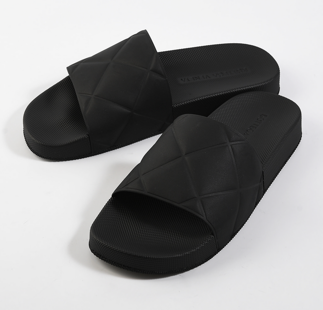 Bottega Veneta Embossed Rubber Slides Black