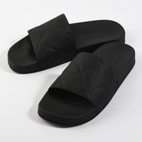 Bottega Veneta Embossed Rubber Slides Black